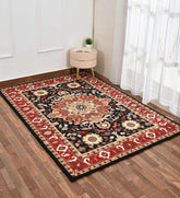 Classic artisan rug with ornate floral medallion centerpiece